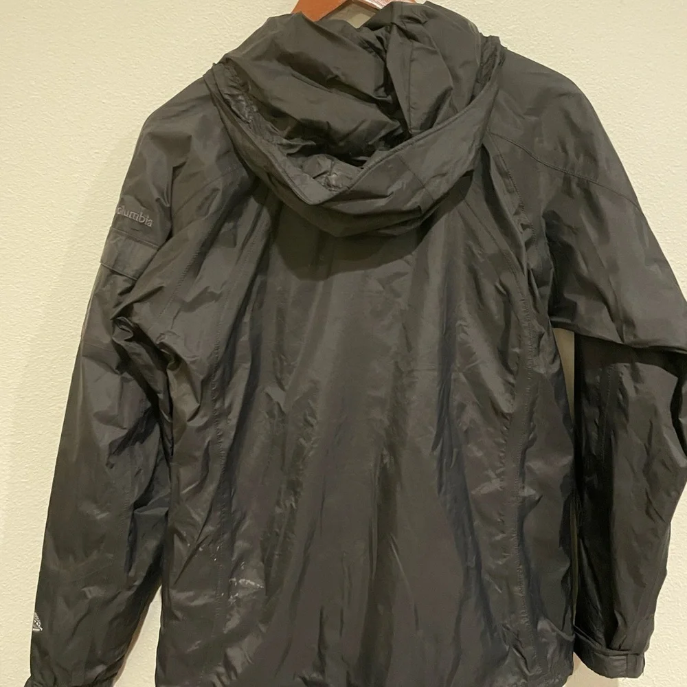 Women’s black hooded waterproof Columbia jacket. Size S